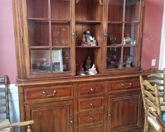 Hooker buffet with lit china cabinet. Glass shelves with plate grooves.