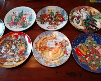 Collectible AVON and Norman Rockwell plates.
