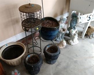 Assorted indoor and outdoor pots. Some heavy duty plastic and some cement.