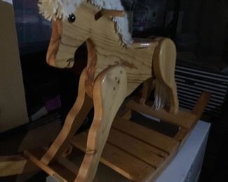 One of two vintage rocking horses