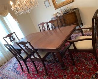 #6	Dining Table w/6 chairs & 3 leaves (2 captains chairs) 44-82x44x29  (has third leg in center)	 $300.00 

