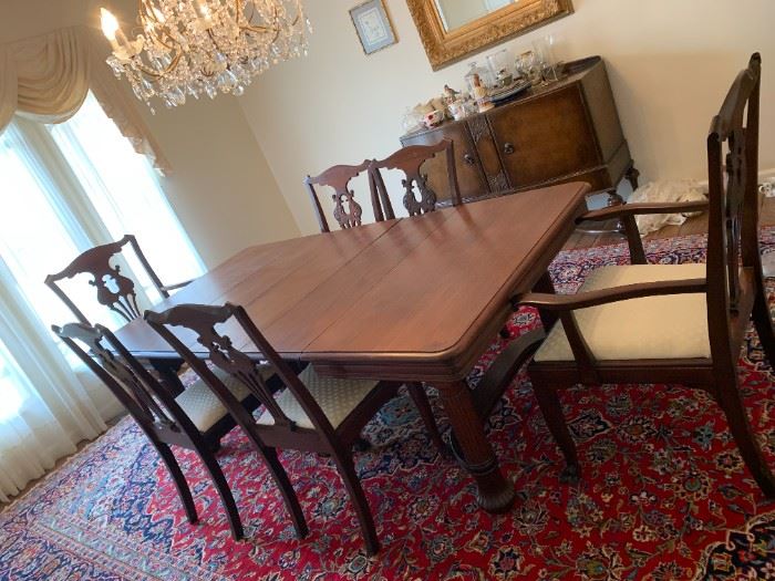 #6	Dining Table w/6 chairs & 3 leaves (2 captains chairs) 44-82x44x29  (has third leg in center)	 $300.00 
