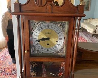 #12	Howard Miller Mantle Clock w/key  13x7x22  (wood)	 $125.00 
