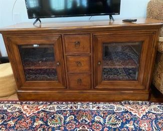 #35	Sligh Beveled Glass Door TV Cabinet w/3 drawers   57x22x30  (as is watermark)	 $75.00 
