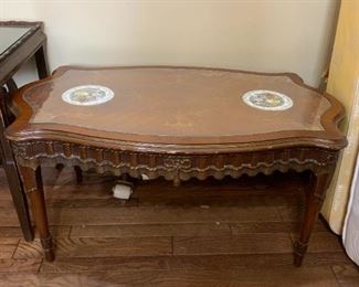 #82	Wood Coffee Table w/2 ceramic Tile inserts w/lady & Man dancing w/Glass protect top 38x22x18	 $75.00 
