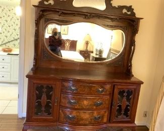 #98	Ornately Carved Burled Front Wood Buffet w/Beveled Top Mirror  w/3 drawers & 2 doors, dove-tailed (watermark on top finish) 59x23x39-93	 $500.00 
