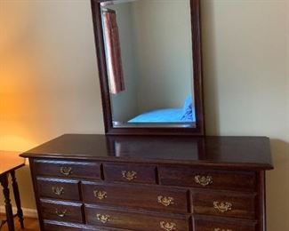 #124	Wood Dresser w/11 drawers & Beveled Mirror  62x20x33.5  Mirror  30.5x51	 $175.00 
