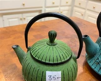 #187	Green iron Teapot	 $35.00 HEAVY
#188	Blue iron  Teapot	 $55.00  HEAVY
