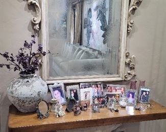 Large stone and wood console table with hand carved custom mirror