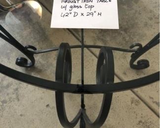 Wrought iron base beveled glass table $225 (Photo 2/2)