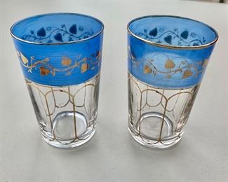 $4 - Two Moroccan tea glasses with blue and gold decoration with vines; 3 1/2 in. (H)