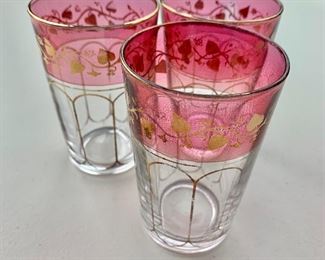 $10 - Three Moroccan tea glasses with red and gold decoration with vines; 3 1/2 in. (H)