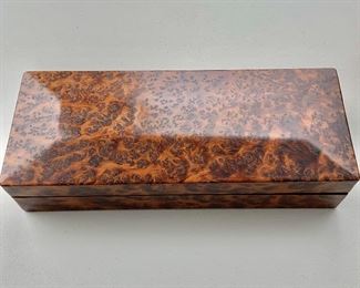 $120 - Rectangular hinged Moroccan (burled) Thuya wood box; 2 1/2 in. (H) x 12 in. (L) x 4 3/4 in. (W)