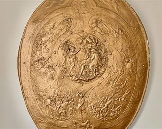 $350  - Milton shield plaster of Paris sculpture - 33" x 25."  As is, some wear and chips to plaster.