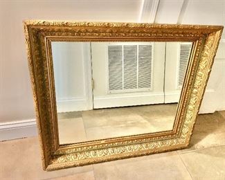$225 - Framed mirror 28 in. (H) x 32 1/2 in. (W) x 3 1/2 in. (depth) with green accents and minor wear and nicks to gilding