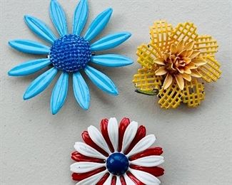 $10 each - Groovy metal flower pins; approx 2" diameter