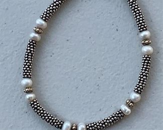 $18 - Silver and pearl stationfashion bracelet with heart shaped clasp