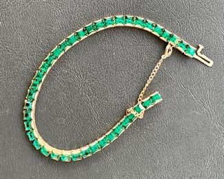 $30 - Green rhinestone tennis bracelet with safety clasp