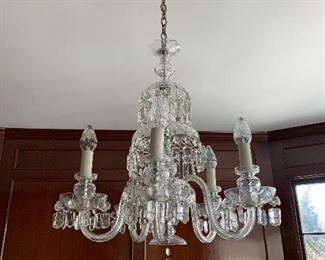 $595 - hand cut leaded crystal five-arm chandelier with small chip; 22 in. (W) x 28 in. (H) x 10 in. chain; $35 removal fee