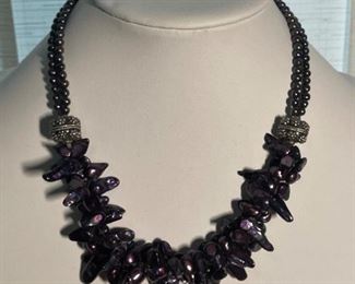 Purple Tahitian style pearl necklace- around 18 1/2 inches long - price 100 dollars