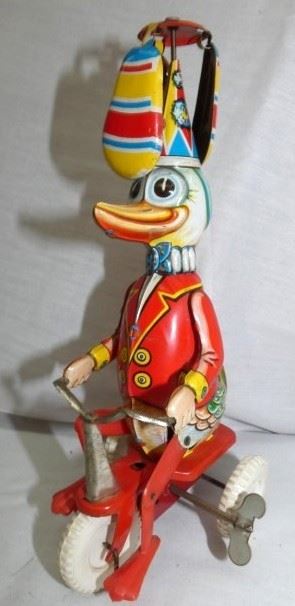 WIND UP DUCK ON TRICYCLE TOY 