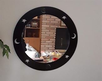 Moon and stars around mirror