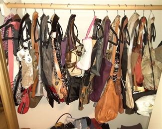 Lots of ladies designer handbags