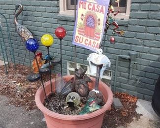 Lots of fun garden art decorations and statuary
