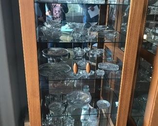Antique Hersey & Fostoria Glass items in both display cases. Solid Teak Display cases, glass shelves and mirrored back and they light up, comes with extra shelves 