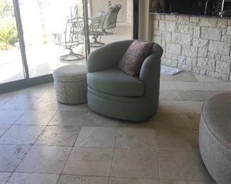 Green swivel chair and ottoman 