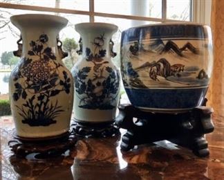Many decorative blue and white jars, vases, bowls, and more