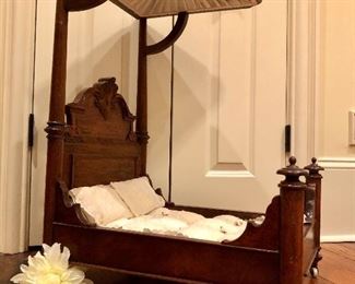 A miniature salesman’s sample or doll’s antique half tester bed with beautiful antique linens 