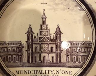 A rare antique New Orleans soup plate, early 19th century, with mulberry transfer of “Municipality No. One”, displaying the Cathedral and Cabildo in Jackson Square 