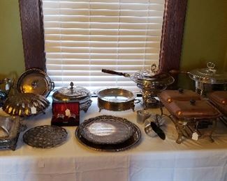 silver plate and copper serving pieces