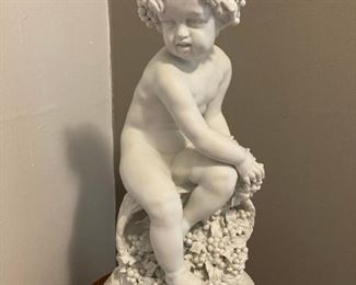 20" tall  L. Badessi parian sculpture of Bacchus atop wine barrel.  19th century  $450  [$1500+ online]