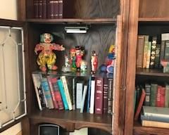 clown collection and the thrid bookcase
