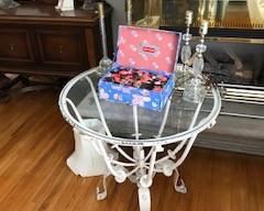 round metal table with glass top