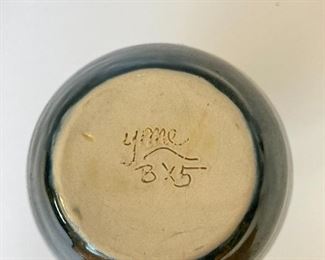 Signed pottery vase. YMC