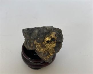 Gold rock figurine