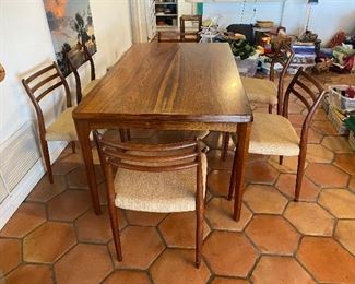 Table: Vejle Stole Mobelfabrik, Made In Denmark
Approx- 30" Tall  64 1/2 L  X  29 3/4 W                                  Chairs: Set of 6 Neils Moller #78 Hardwood 17" to seat 32"to back