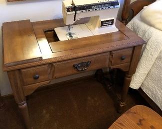 Singer sewing machine in a desk 