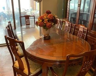 Awesome table with matching china hutch eight chairs