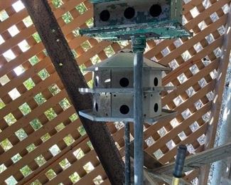 vintage aluminum bird condos on tall poles