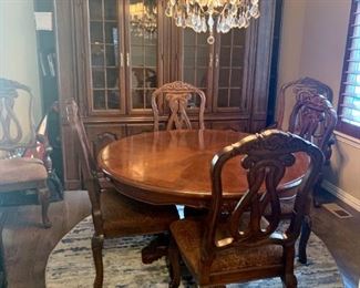 Cherry Dining dining room:  6 chairs (2 are captain chairs), matching Cherry China Hutch and Rug.