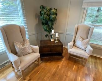 Pair nailhead wing chairs neutral in color