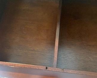 Divided drawers in file cabinet 