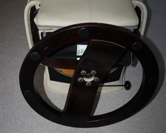 $895. Hjellegjerde Stressless recliner and foot stool. Cream leather.