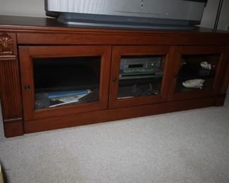 $125. Cherry colored TV stand.