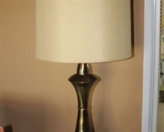 $75 each. One of two heavy brass table lamps.  From base to finnial 50 inches.