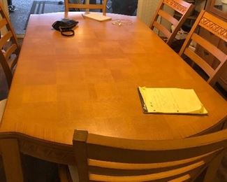 Long solid wood dining table comes with 2 leafs( one already in table)